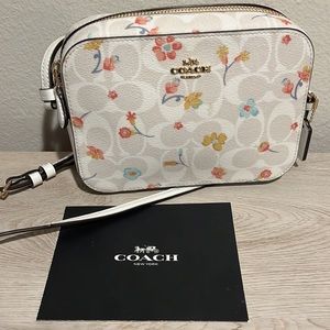New (has packaging but removed tags) Coach Floral Crossbody, perfect size!
